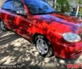 Красный Дэу Ланос, объемом двигателя 1.6 л и пробегом 155 тыс. км за 4000 $, фото 1 на Automoto.ua