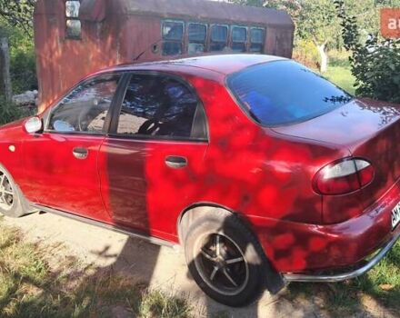 Червоний Деу Ланос, об'ємом двигуна 1.6 л та пробігом 305 тис. км за 3100 $, фото 1 на Automoto.ua