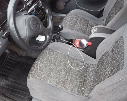 Красный Дэу Ланос, объемом двигателя 1.5 л и пробегом 210 тыс. км за 1800 $, фото 5 на Automoto.ua