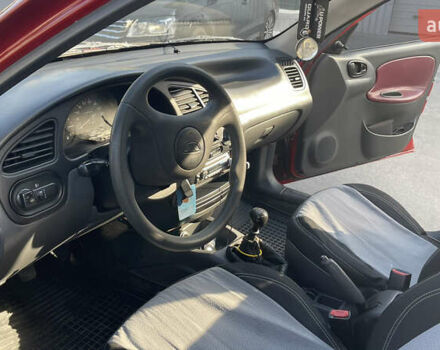 Красный Дэу Ланос, объемом двигателя 1.5 л и пробегом 148 тыс. км за 2600 $, фото 35 на Automoto.ua