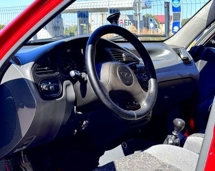 Красный Дэу Ланос, объемом двигателя 1.4 л и пробегом 112 тыс. км за 3000 $, фото 5 на Automoto.ua