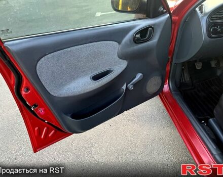 Красный Дэу Ланос, объемом двигателя 1.4 л и пробегом 150 тыс. км за 2700 $, фото 4 на Automoto.ua