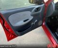 Красный Дэу Ланос, объемом двигателя 1.4 л и пробегом 150 тыс. км за 2700 $, фото 4 на Automoto.ua