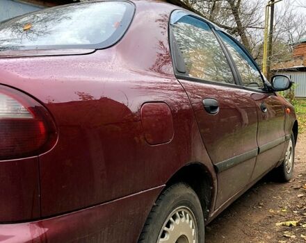 Красный Дэу Ланос, объемом двигателя 1.6 л и пробегом 161 тыс. км за 2200 $, фото 2 на Automoto.ua