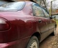 Красный Дэу Ланос, объемом двигателя 1.6 л и пробегом 161 тыс. км за 2200 $, фото 2 на Automoto.ua