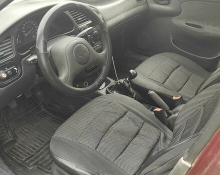 Красный Дэу Ланос, объемом двигателя 1.5 л и пробегом 175 тыс. км за 1850 $, фото 3 на Automoto.ua