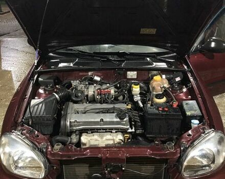Красный Дэу Ланос, объемом двигателя 1.6 л и пробегом 161 тыс. км за 2200 $, фото 10 на Automoto.ua