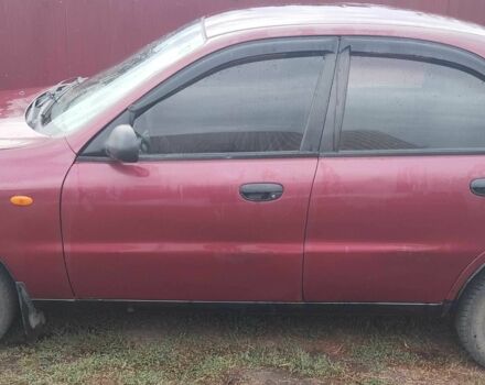 Красный Дэу Ланос, объемом двигателя 1.5 л и пробегом 175 тыс. км за 1850 $, фото 1 на Automoto.ua