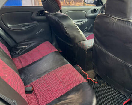 Красный Дэу Ланос, объемом двигателя 1.6 л и пробегом 179 тыс. км за 2099 $, фото 6 на Automoto.ua