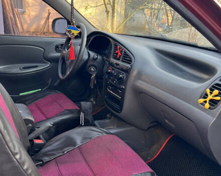 Красный Дэу Ланос, объемом двигателя 1.6 л и пробегом 179 тыс. км за 2099 $, фото 5 на Automoto.ua