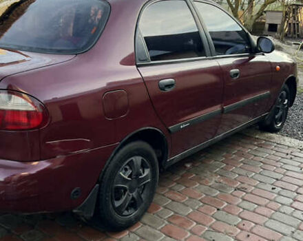 Красный Дэу Ланос, объемом двигателя 1.6 л и пробегом 179 тыс. км за 2099 $, фото 3 на Automoto.ua