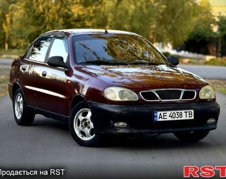 Красный Дэу Ланос, объемом двигателя 1.5 л и пробегом 300 тыс. км за 1350 $, фото 1 на Automoto.ua