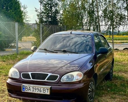 Красный Дэу Ланос, объемом двигателя 1.4 л и пробегом 190 тыс. км за 2300 $, фото 2 на Automoto.ua