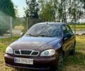 Красный Дэу Ланос, объемом двигателя 1.4 л и пробегом 190 тыс. км за 2300 $, фото 2 на Automoto.ua