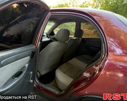 Красный Дэу Ланос, объемом двигателя 1.5 л и пробегом 300 тыс. км за 1350 $, фото 9 на Automoto.ua