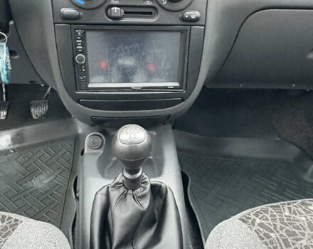 Красный Дэу Ланос, объемом двигателя 1.5 л и пробегом 74 тыс. км за 3400 $, фото 17 на Automoto.ua