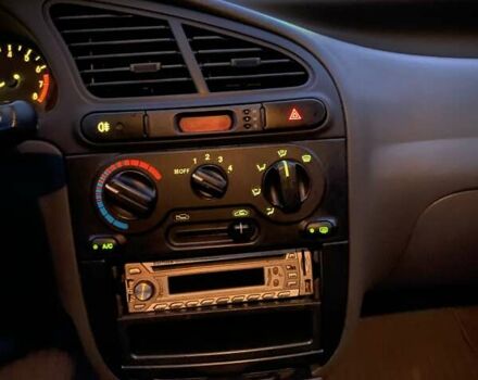 Красный Дэу Ланос, объемом двигателя 1.5 л и пробегом 150 тыс. км за 2500 $, фото 5 на Automoto.ua