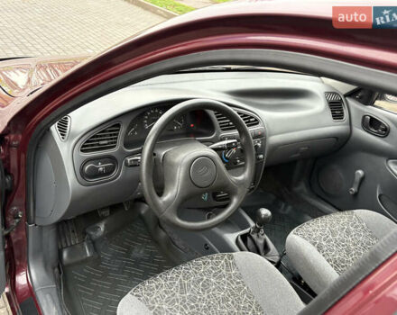 Красный Дэу Ланос, объемом двигателя 1.5 л и пробегом 74 тыс. км за 3400 $, фото 10 на Automoto.ua