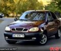 Красный Дэу Ланос, объемом двигателя 1.5 л и пробегом 300 тыс. км за 1350 $, фото 1 на Automoto.ua