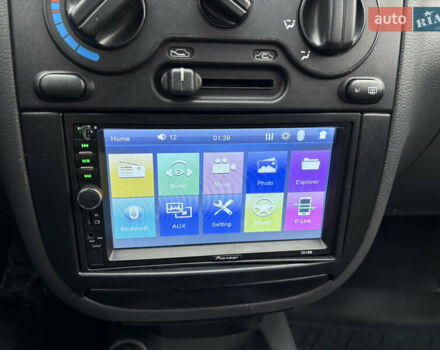 Красный Дэу Ланос, объемом двигателя 1.5 л и пробегом 74 тыс. км за 3400 $, фото 22 на Automoto.ua