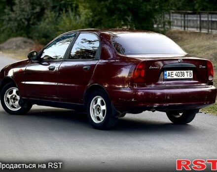 Красный Дэу Ланос, объемом двигателя 1.5 л и пробегом 300 тыс. км за 1350 $, фото 6 на Automoto.ua