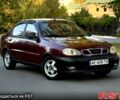Красный Дэу Ланос, объемом двигателя 1.5 л и пробегом 300 тыс. км за 1350 $, фото 4 на Automoto.ua