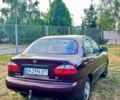 Красный Дэу Ланос, объемом двигателя 1.4 л и пробегом 190 тыс. км за 2300 $, фото 3 на Automoto.ua
