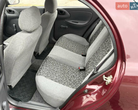 Красный Дэу Ланос, объемом двигателя 1.5 л и пробегом 74 тыс. км за 3400 $, фото 13 на Automoto.ua