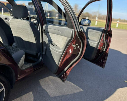 Красный Дэу Ланос, объемом двигателя 1.5 л и пробегом 134 тыс. км за 2650 $, фото 17 на Automoto.ua