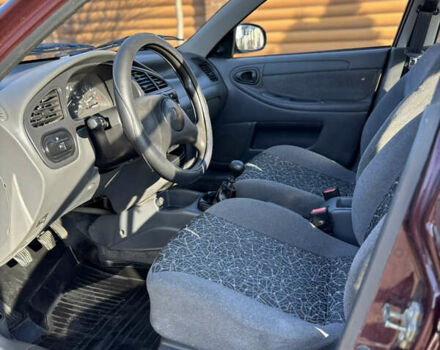 Красный Дэу Ланос, объемом двигателя 1.5 л и пробегом 134 тыс. км за 2650 $, фото 10 на Automoto.ua