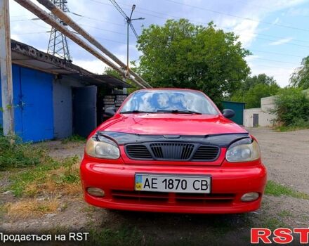 Красный Дэу Ланос, объемом двигателя 1.5 л и пробегом 172 тыс. км за 2000 $, фото 1 на Automoto.ua
