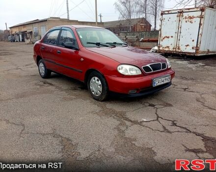 Красный Дэу Ланос, объемом двигателя 1.5 л и пробегом 303 тыс. км за 1550 $, фото 1 на Automoto.ua
