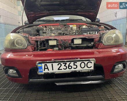 Червоний Деу Ланос, об'ємом двигуна 1.5 л та пробігом 310 тис. км за 2400 $, фото 1 на Automoto.ua