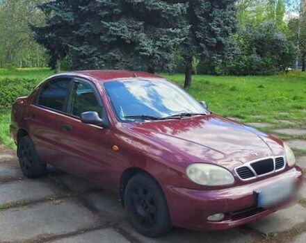 Красный Дэу Ланос, объемом двигателя 1.5 л и пробегом 283 тыс. км за 2800 $, фото 1 на Automoto.ua