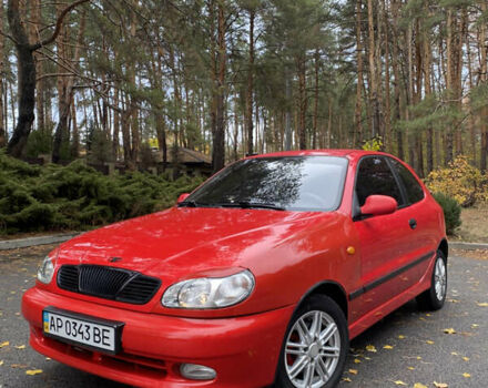 Красный Дэу Ланос, объемом двигателя 1.6 л и пробегом 235 тыс. км за 2350 $, фото 1 на Automoto.ua