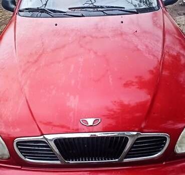 Красный Дэу Ланос, объемом двигателя 1.5 л и пробегом 150 тыс. км за 1000 $, фото 1 на Automoto.ua