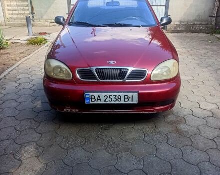 Красный Дэу Ланос, объемом двигателя 1.5 л и пробегом 203 тыс. км за 1650 $, фото 1 на Automoto.ua