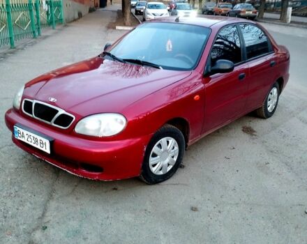 Красный Дэу Ланос, объемом двигателя 1.5 л и пробегом 207 тыс. км за 2000 $, фото 1 на Automoto.ua