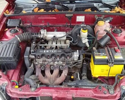 Красный Дэу Ланос, объемом двигателя 1.5 л и пробегом 174 тыс. км за 1550 $, фото 1 на Automoto.ua