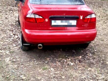 Красный Дэу Ланос, объемом двигателя 1.5 л и пробегом 193 тыс. км за 2000 $, фото 1 на Automoto.ua