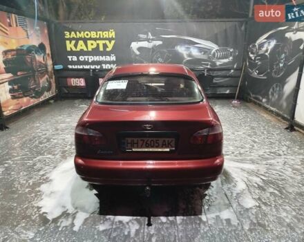 Красный Дэу Ланос, объемом двигателя 1.5 л и пробегом 200 тыс. км за 2250 $, фото 1 на Automoto.ua