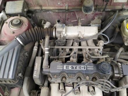 Красный Дэу Ланос, объемом двигателя 1.5 л и пробегом 208 тыс. км за 1200 $, фото 1 на Automoto.ua