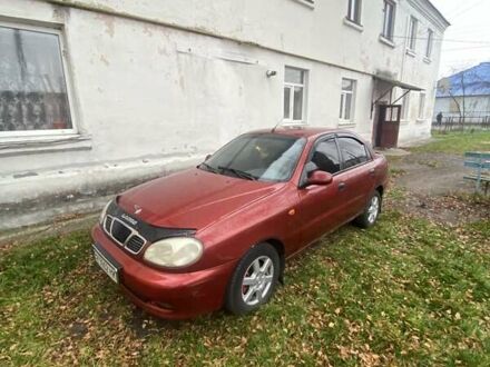 Красный Дэу Ланос, объемом двигателя 1.6 л и пробегом 297 тыс. км за 2500 $, фото 1 на Automoto.ua