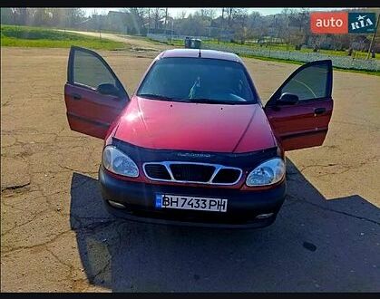 Красный Дэу Ланос, объемом двигателя 1.6 л и пробегом 175 тыс. км за 2500 $, фото 1 на Automoto.ua