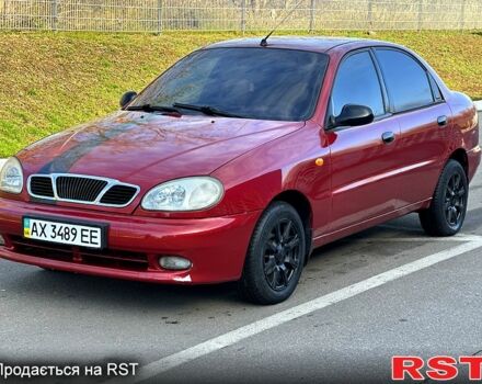 Красный Дэу Ланос, объемом двигателя 1.5 л и пробегом 200 тыс. км за 1650 $, фото 1 на Automoto.ua