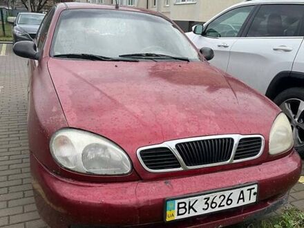 Красный Дэу Ланос, объемом двигателя 1.35 л и пробегом 180 тыс. км за 950 $, фото 1 на Automoto.ua