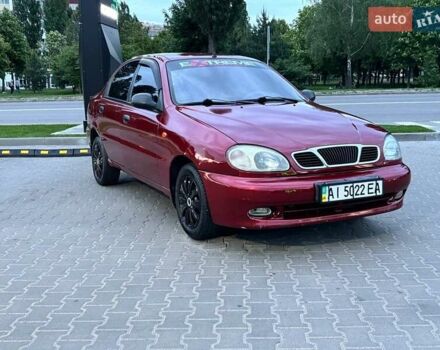 Красный Дэу Ланос, объемом двигателя 1.5 л и пробегом 300 тыс. км за 2300 $, фото 1 на Automoto.ua