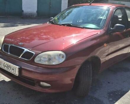 Красный Дэу Ланос, объемом двигателя 1.3 л и пробегом 258 тыс. км за 2130 $, фото 1 на Automoto.ua