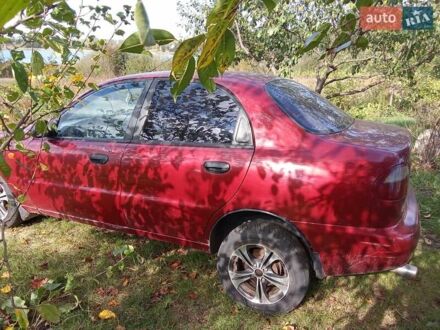 Дэу Ланос 2004 в Попельня на Automoto.ua Красный Дэу Ланос, объемом двигателя 0 л и пробегом 313 тыс. км за 1700 $, фото 1 на Automoto.ua