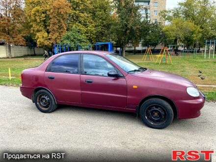 Червоний Деу Ланос, об'ємом двигуна 1.6 л та пробігом 210 тис. км за 2000 $, фото 1 на Automoto.ua